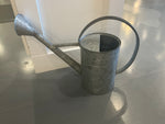 Large metal watering can