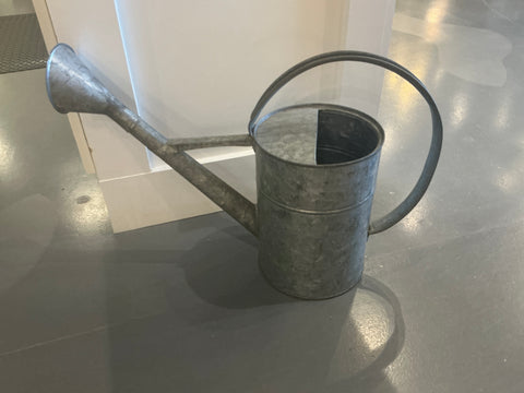 Large metal watering can