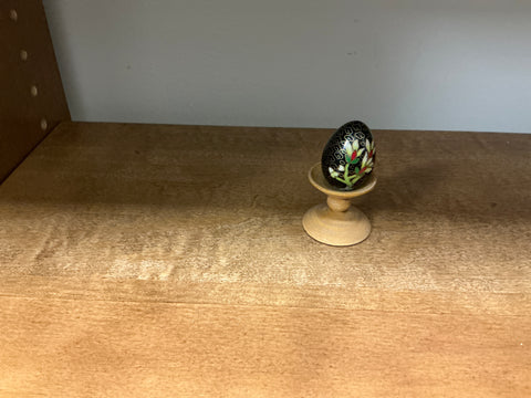 Tiny egg on stand