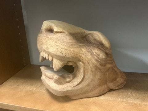 Carved puma head