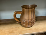 Hand carved Wood pitcher