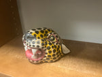 Carved and painted jaguar head