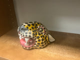Carved and painted jaguar head