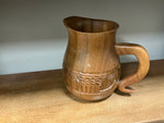 Hand carved Wood pitcher
