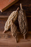 SET OF THREE SPOOLS OF PAPER ROPE