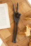 CAST IRON SKELETON ARM - PEACE